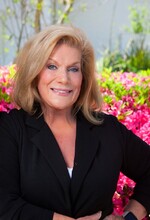 Rita McIntosh,  Broker